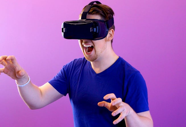 Man using a VR headset while playing a video game